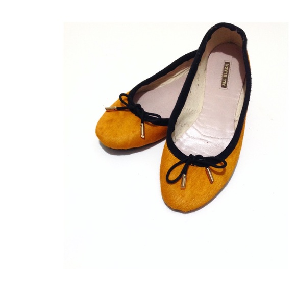 mustard and black shoes